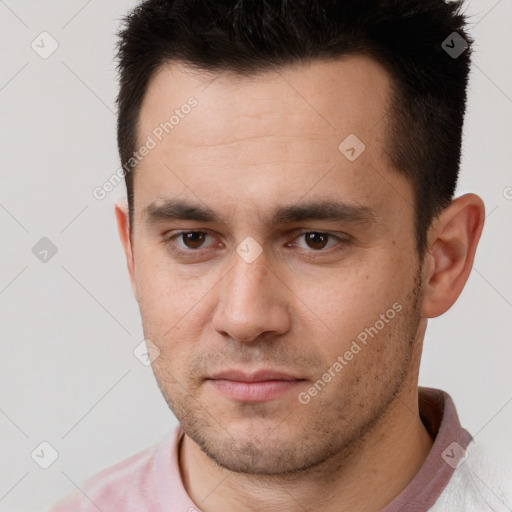 Neutral white young-adult male with short  brown hair and brown eyes