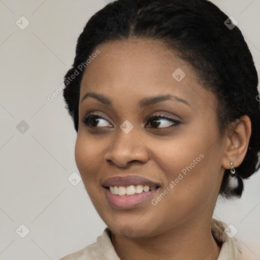 Joyful latino young-adult female with short  black hair and brown eyes