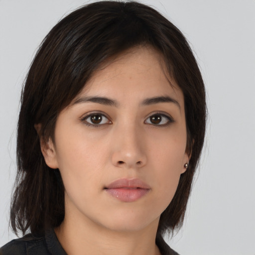 Neutral asian young-adult female with medium  brown hair and brown eyes