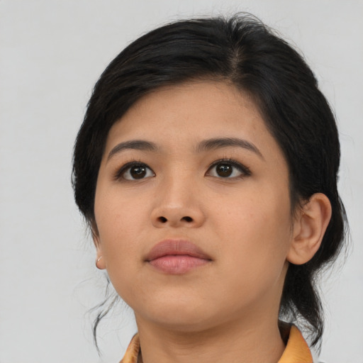 Neutral asian young-adult female with medium  brown hair and brown eyes