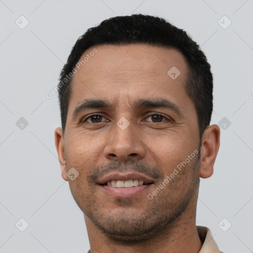 Neutral white young-adult male with short  black hair and brown eyes