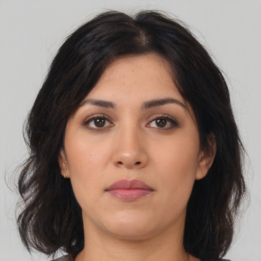 Neutral asian young-adult female with medium  brown hair and brown eyes