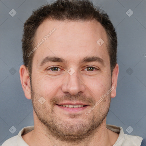 Joyful white adult male with short  brown hair and brown eyes