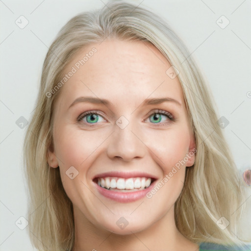 Joyful white young-adult female with long  brown hair and blue eyes