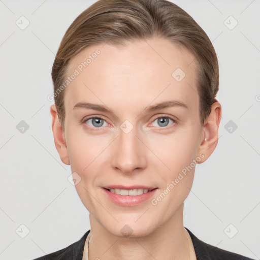 Joyful white young-adult female with short  brown hair and grey eyes