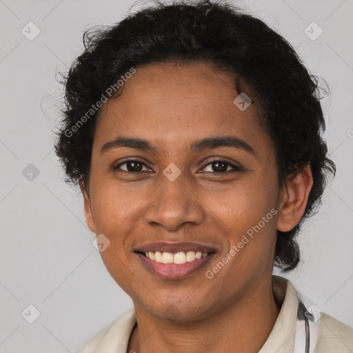 Joyful latino young-adult female with short  brown hair and brown eyes