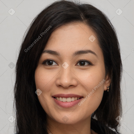 Joyful asian young-adult female with long  brown hair and brown eyes