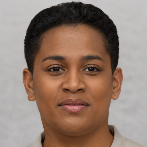 Joyful latino young-adult female with short  brown hair and brown eyes