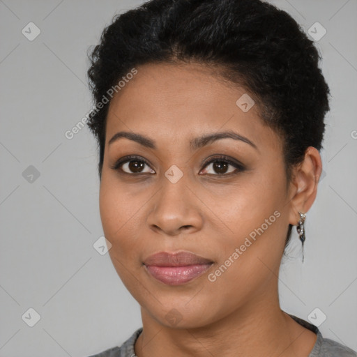 Joyful latino young-adult female with short  brown hair and brown eyes