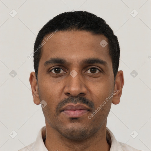 Neutral black young-adult male with short  black hair and brown eyes