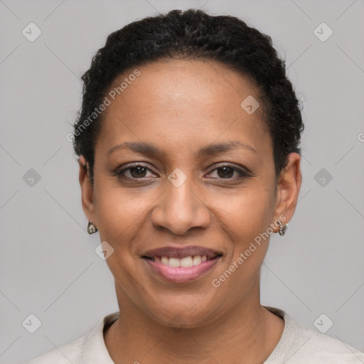 Joyful latino young-adult female with short  black hair and brown eyes