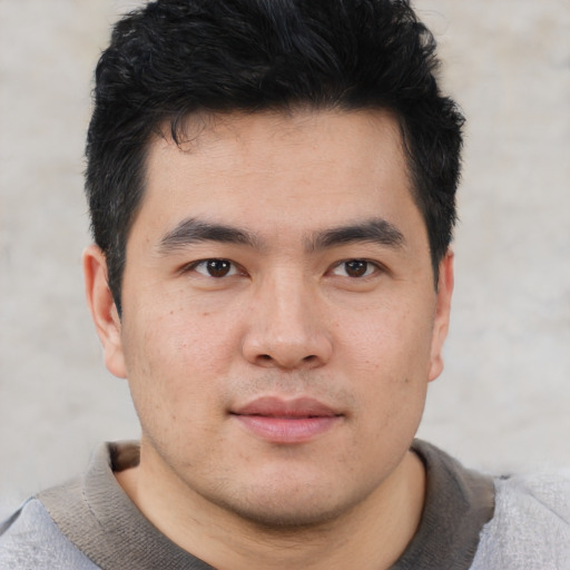 Neutral asian young-adult male with short  black hair and brown eyes