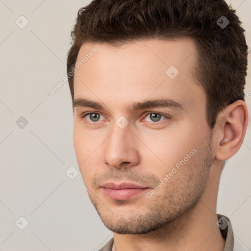 Neutral white young-adult male with short  brown hair and brown eyes