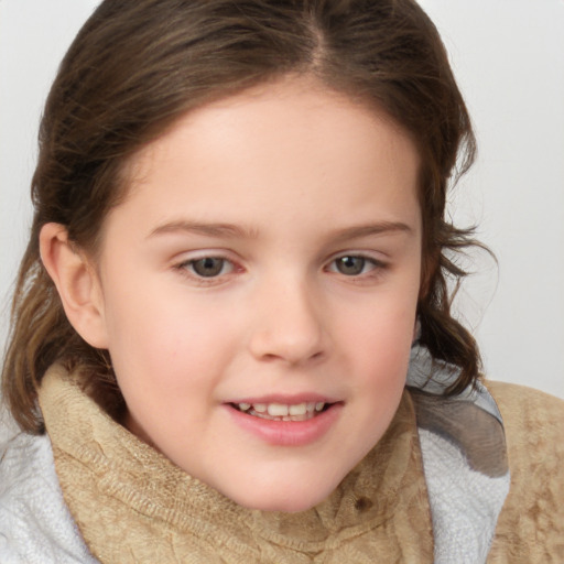 Joyful white child female with medium  brown hair and brown eyes