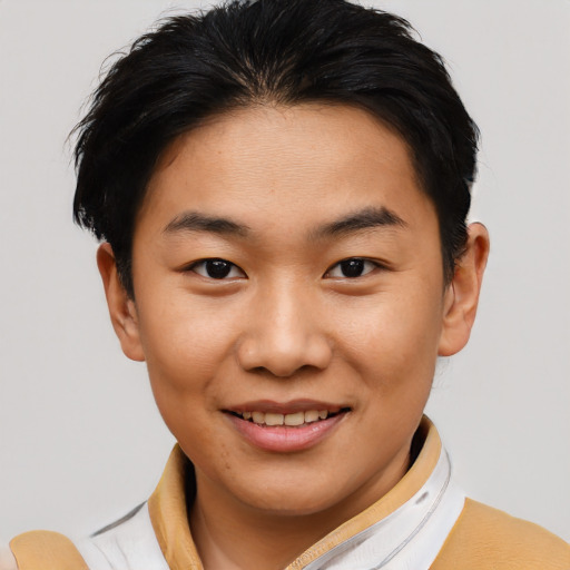Joyful asian young-adult female with short  brown hair and brown eyes
