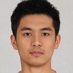 Neutral asian young-adult male with short  brown hair and brown eyes