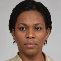 Neutral black young-adult female with short  brown hair and brown eyes