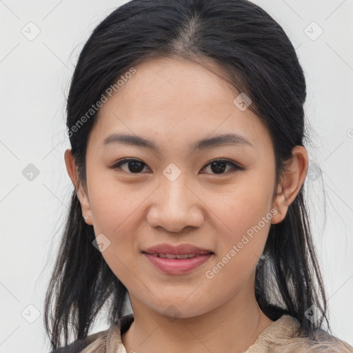 Joyful asian young-adult female with medium  brown hair and brown eyes