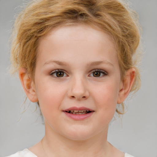 Joyful white child female with medium  blond hair and brown eyes