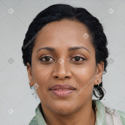 Joyful black young-adult female with medium  black hair and brown eyes