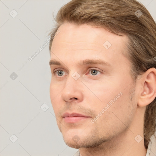 Neutral white young-adult male with medium  brown hair and grey eyes