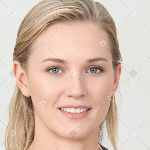 Joyful white young-adult female with long  brown hair and blue eyes