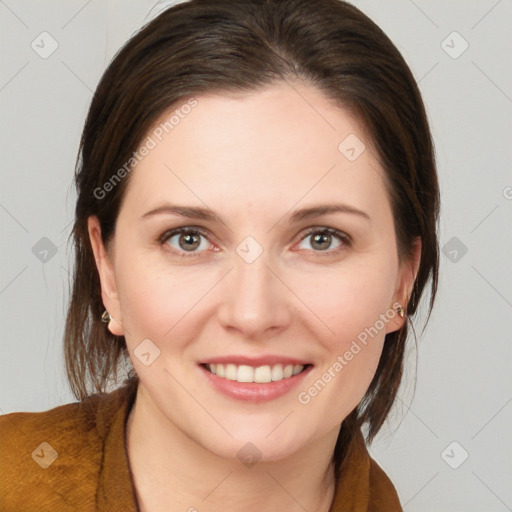 Joyful white young-adult female with medium  brown hair and brown eyes