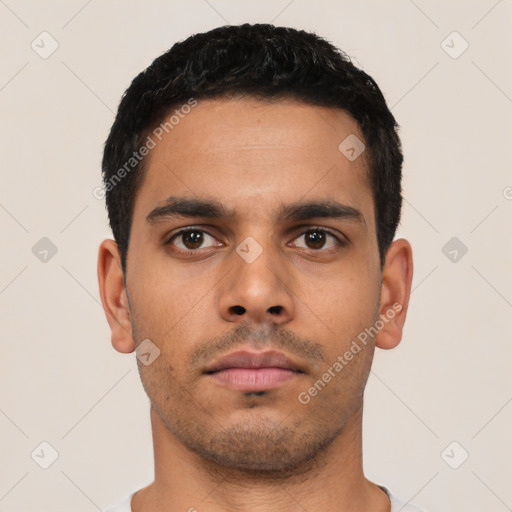 Neutral latino young-adult male with short  black hair and brown eyes