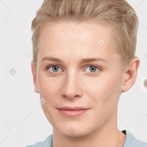 Joyful white young-adult female with short  brown hair and grey eyes