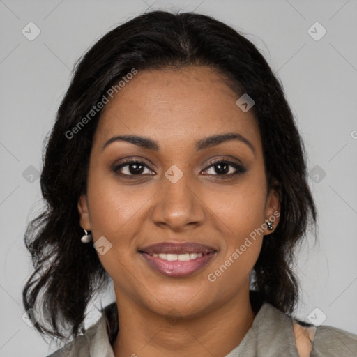 Joyful black young-adult female with medium  brown hair and brown eyes