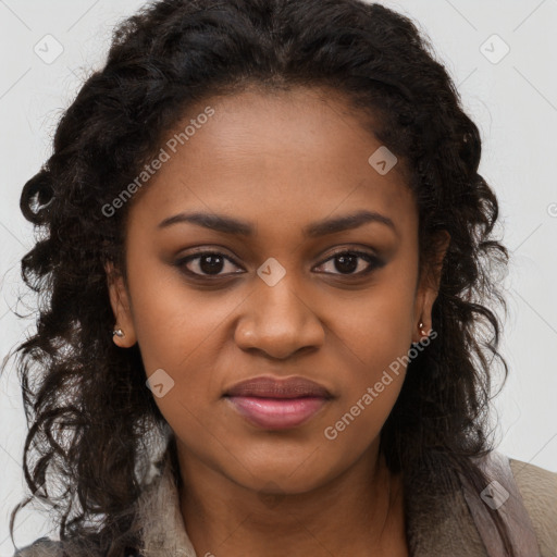 Joyful black young-adult female with long  brown hair and brown eyes