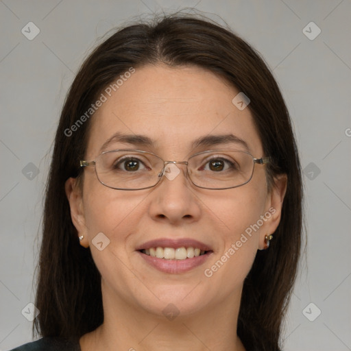 Joyful white adult female with medium  brown hair and brown eyes