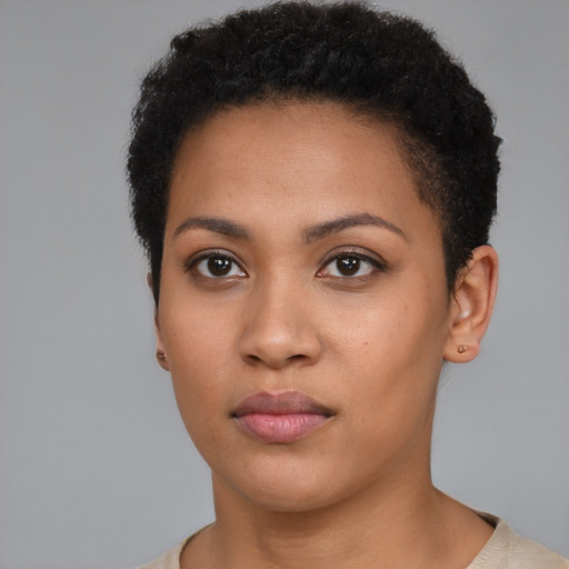 Neutral latino young-adult female with short  black hair and brown eyes