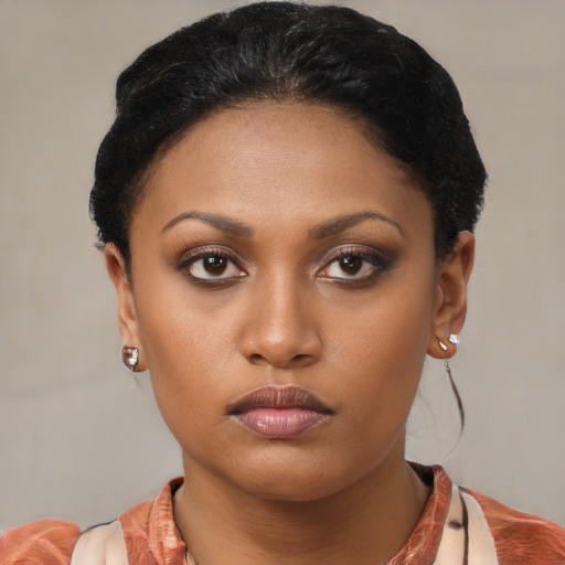 Neutral latino young-adult female with short  brown hair and brown eyes