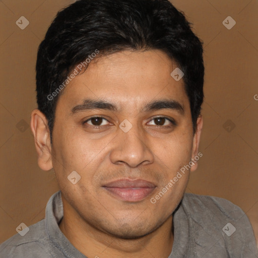 Joyful latino young-adult male with short  black hair and brown eyes