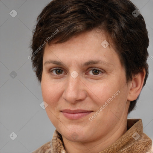 Joyful white adult female with short  brown hair and brown eyes