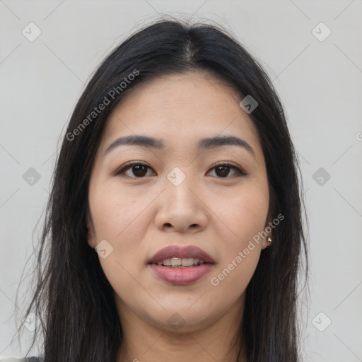 Joyful asian young-adult female with long  brown hair and brown eyes