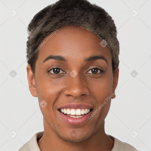 Joyful black young-adult female with short  brown hair and brown eyes