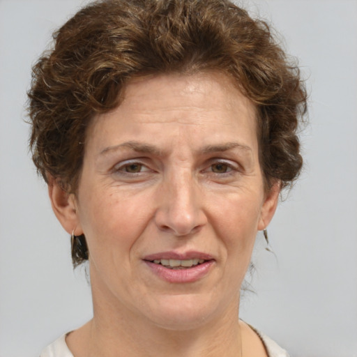 Joyful white middle-aged female with short  brown hair and brown eyes