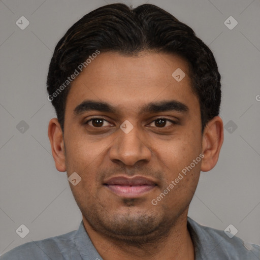 Joyful black young-adult male with short  black hair and brown eyes