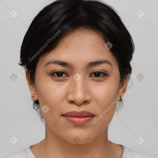 Joyful asian young-adult female with medium  black hair and brown eyes