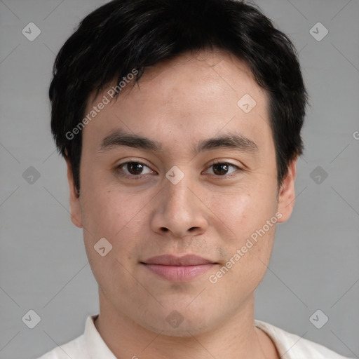 Joyful white young-adult male with short  black hair and brown eyes