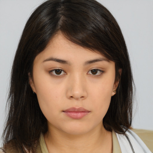 Neutral asian young-adult female with medium  brown hair and brown eyes