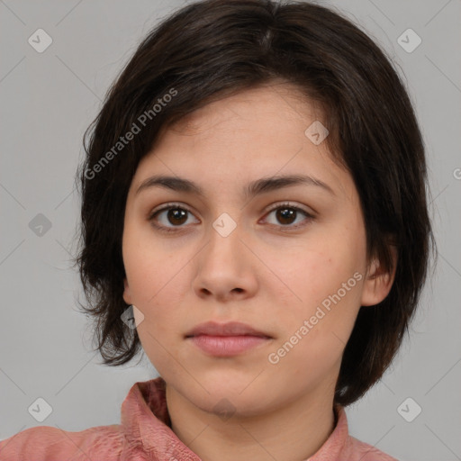 Neutral white young-adult female with medium  brown hair and brown eyes