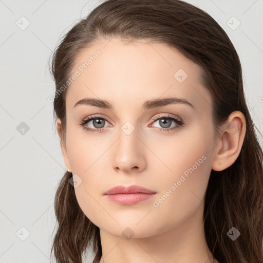 Neutral white young-adult female with long  brown hair and brown eyes