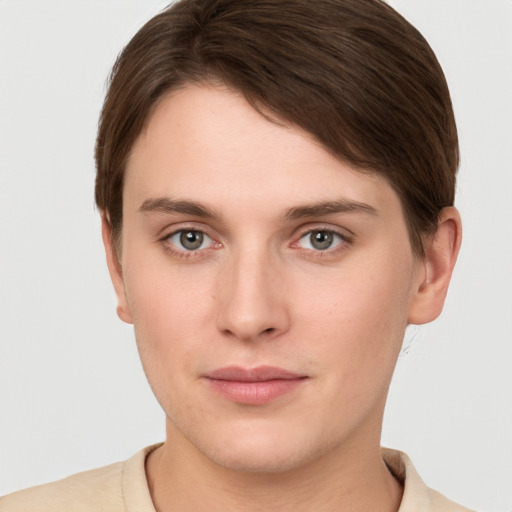 Neutral white young-adult female with short  brown hair and grey eyes