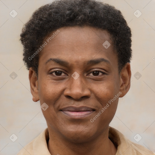 Joyful black adult male with short  brown hair and brown eyes