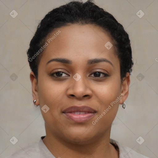 Joyful black young-adult female with short  brown hair and brown eyes