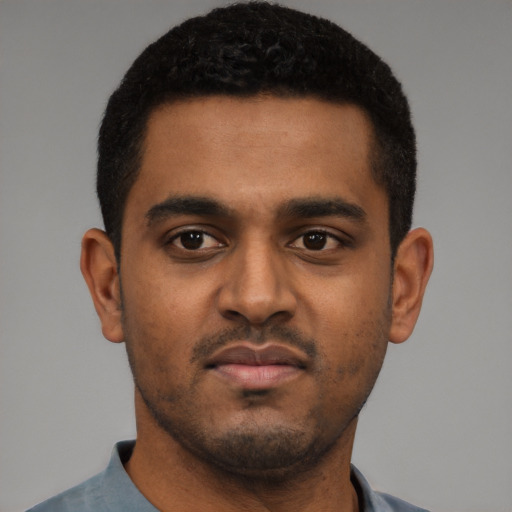 Neutral black young-adult male with short  black hair and brown eyes