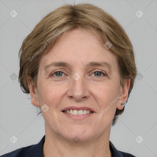 Joyful white adult female with medium  brown hair and grey eyes